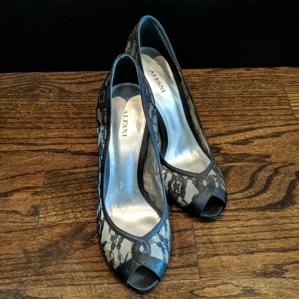 Black lacy peep toe pumps